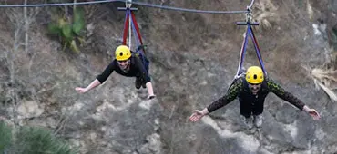 Two guests zip lining at Canyons in Ocala, FL