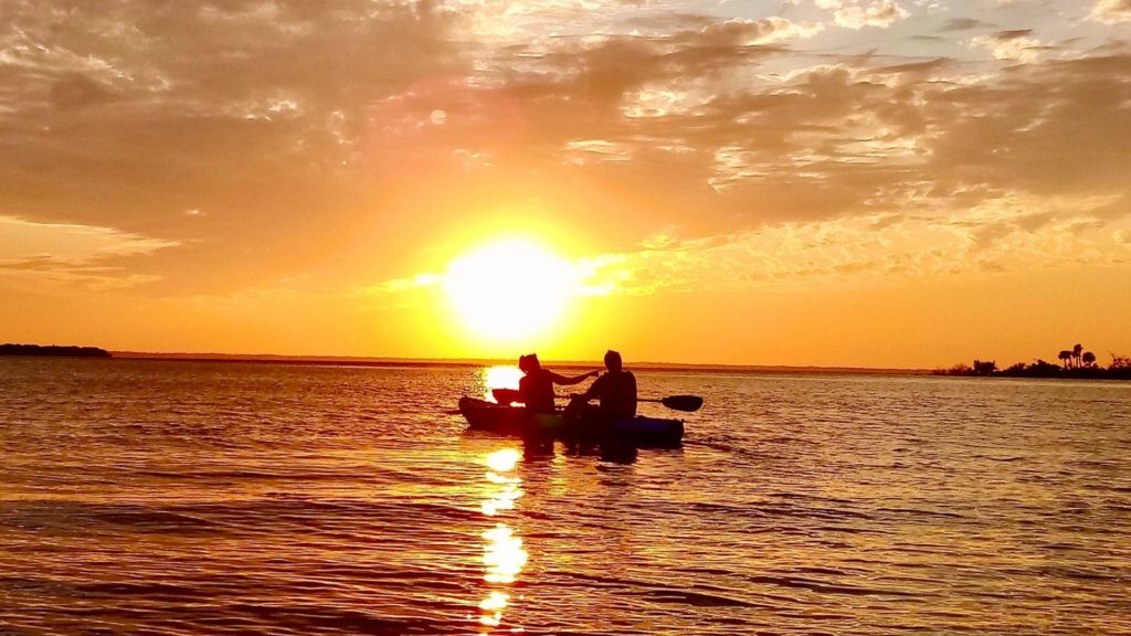 Cover - Couple Kayaking During a Vibrant Sunset on a BK Adventure Tour
