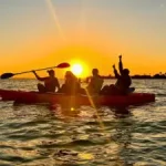 Friends during a Sunset Kayaking with Bioluminescence near Titusville, Cocoa Beach and Cape Canaveral