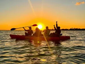 Friends during a Sunset Kayaking with Bioluminescence near Titusville, Cocoa Beach and Cape Canaveral
