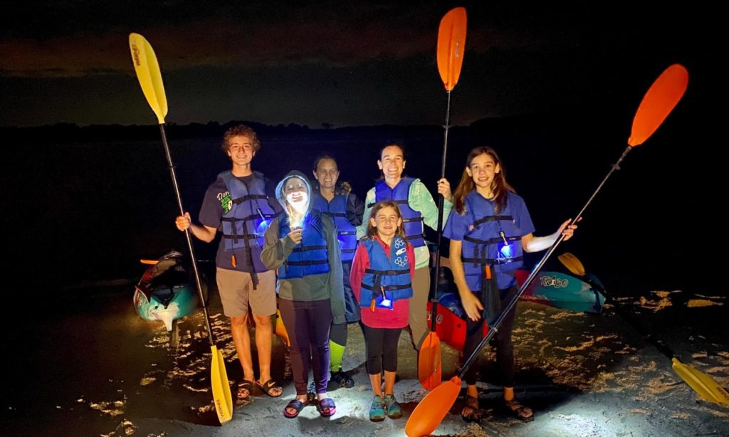 Family on bioluminescence tour in st. augustine