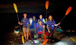 Family on bioluminescence tour in st. augustine